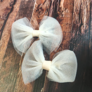 Soft lemon pigtail tulle bows