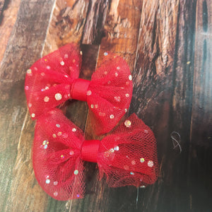 Red pigtail tulle bows