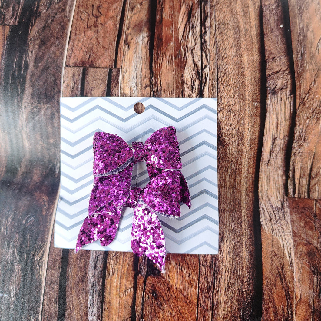 Purple pigtail bows