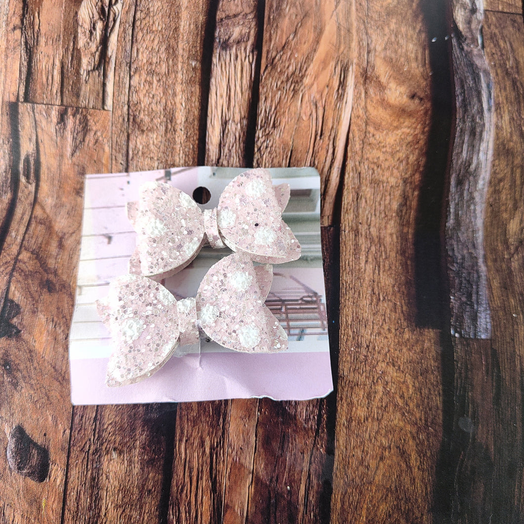 Pink spotty pigtail bows