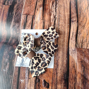 Leopard print pigtail bows