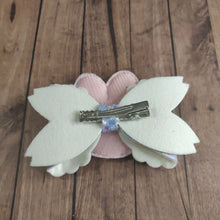 Load image into Gallery viewer, Easter bunny hair bow with a padded colour change sequin centre
