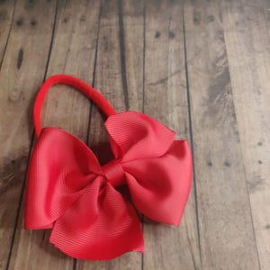 Red pinwheel bow headband