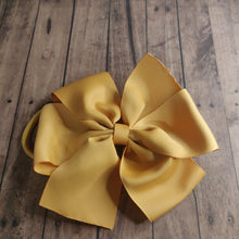Load image into Gallery viewer, Gold/mustard pinwheel bow headband

