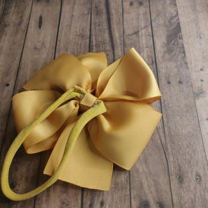 Gold/mustard pinwheel bow headband