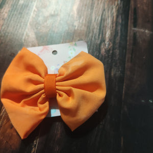 orange fabric bow