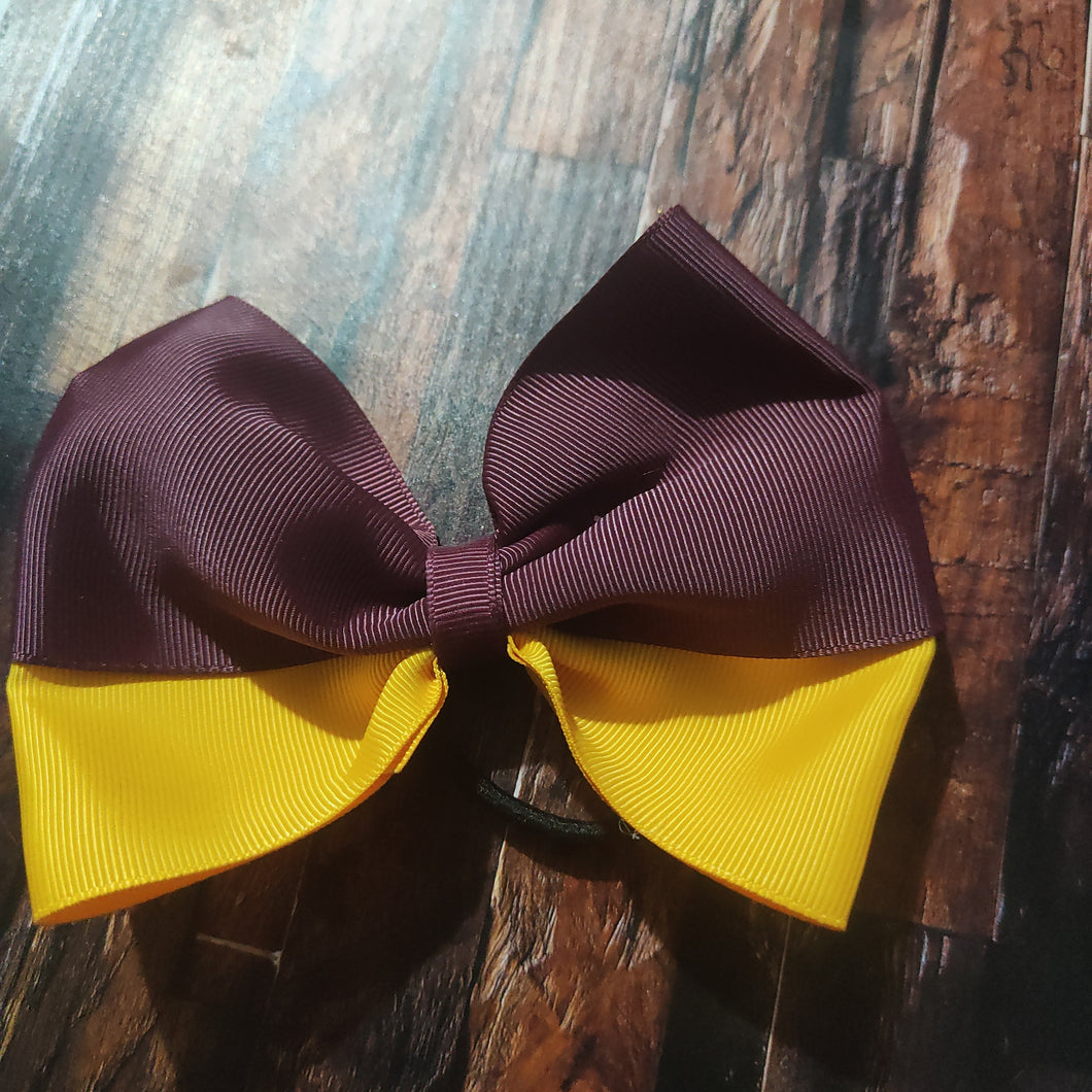 maroon and yellow bow on bobble