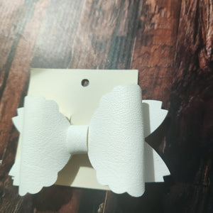white leatherette bow